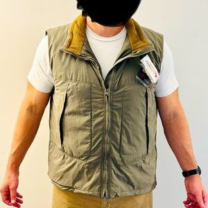 Large military grade, cold weather layering, puffy vest.
